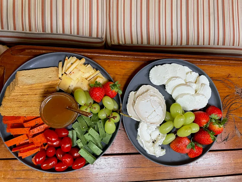 Cheese board and Madeira delicacies served on board